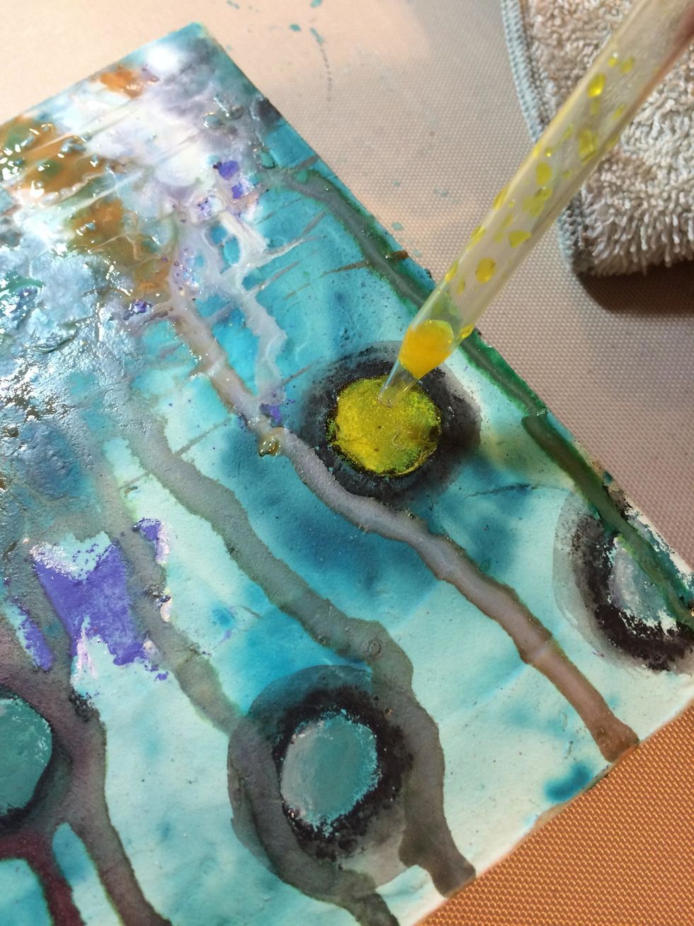 I colored in the circles with Allure Minx Shimmering Inks using the dropper that's included with the bottle.