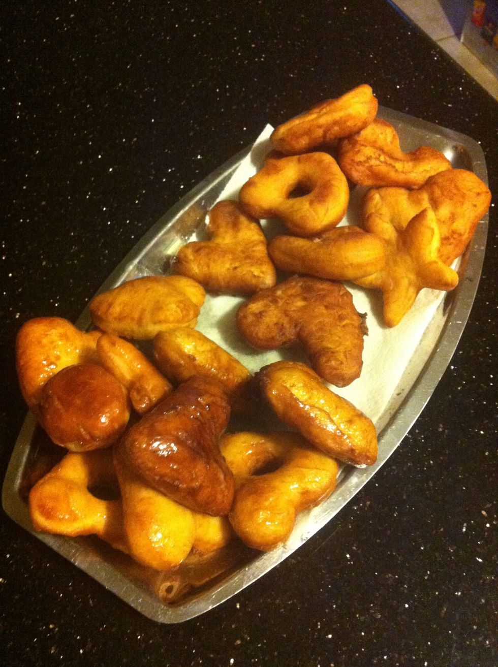 I combined powdered sugar, vanilla, and water to form a simple glaze that I dipped some of my donuts in. Either way it tastes phenomenal. Enjoy!