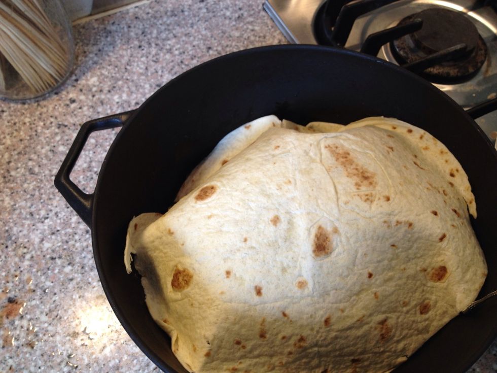 I covered my meat with another wrap to keep it moist because I need a meat thermometer in the meat in order to control the core temp. Place in a pre heated oven at 225 f yes 225 f. for 8-10 hours