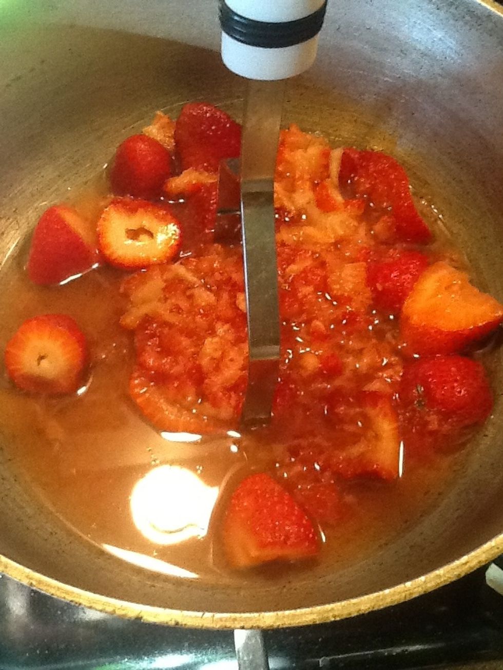 I crushed the strawberries with a potato masher. I than turned my stove to medium heat. I let it cook for 5 minutes or until it boiled. I than lowered the heat and let it simmer 2 more minutes
