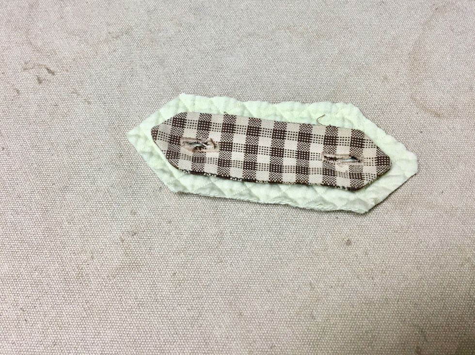 I cut 1 tab.  I wanted my tabs to be a little larger so I cut them 1 inch larger all the way around.  The size depends on the style and size of your chair