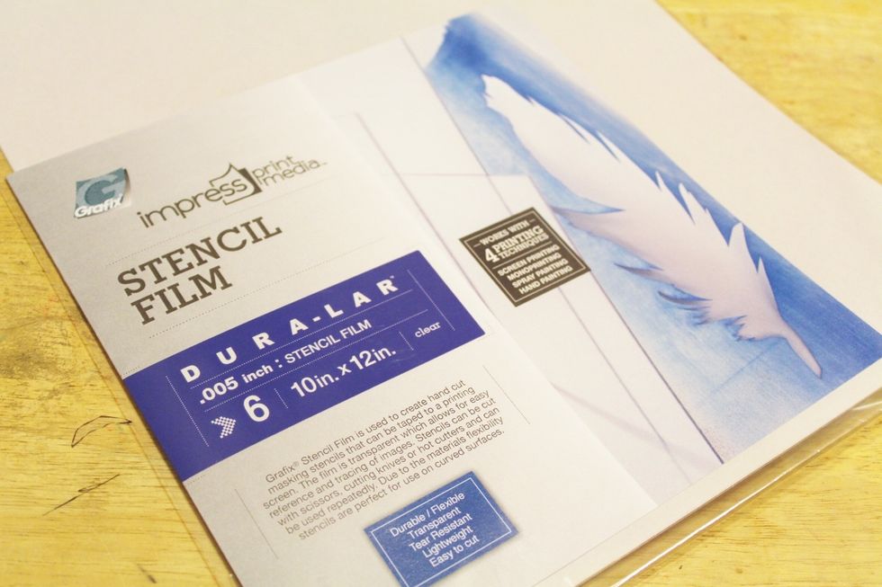 I cut 3 pieces of GRAFIX Dura-Lar Stencil Film about 1 1/2" around all sides, larger than my image...