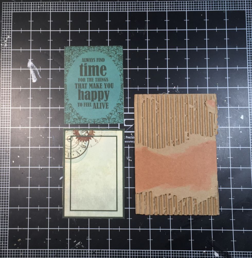 I cut a couple of ATC size pieces from one of the papers. And, I cut a piece of cardboard form the box the kit came in. (Great for layers and mats!)