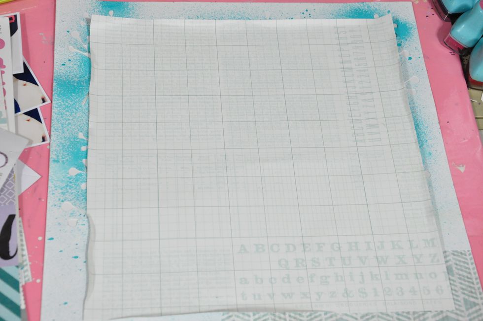 I cut a couple of inches to the paper in the middle and adhered to the base.