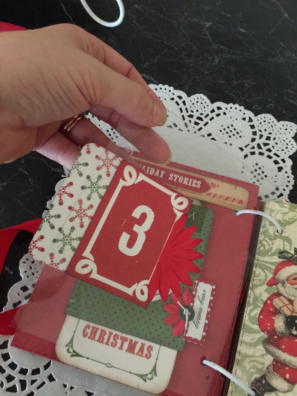 I cut a flower in half and glued half to the front and half to the back on top of each other.