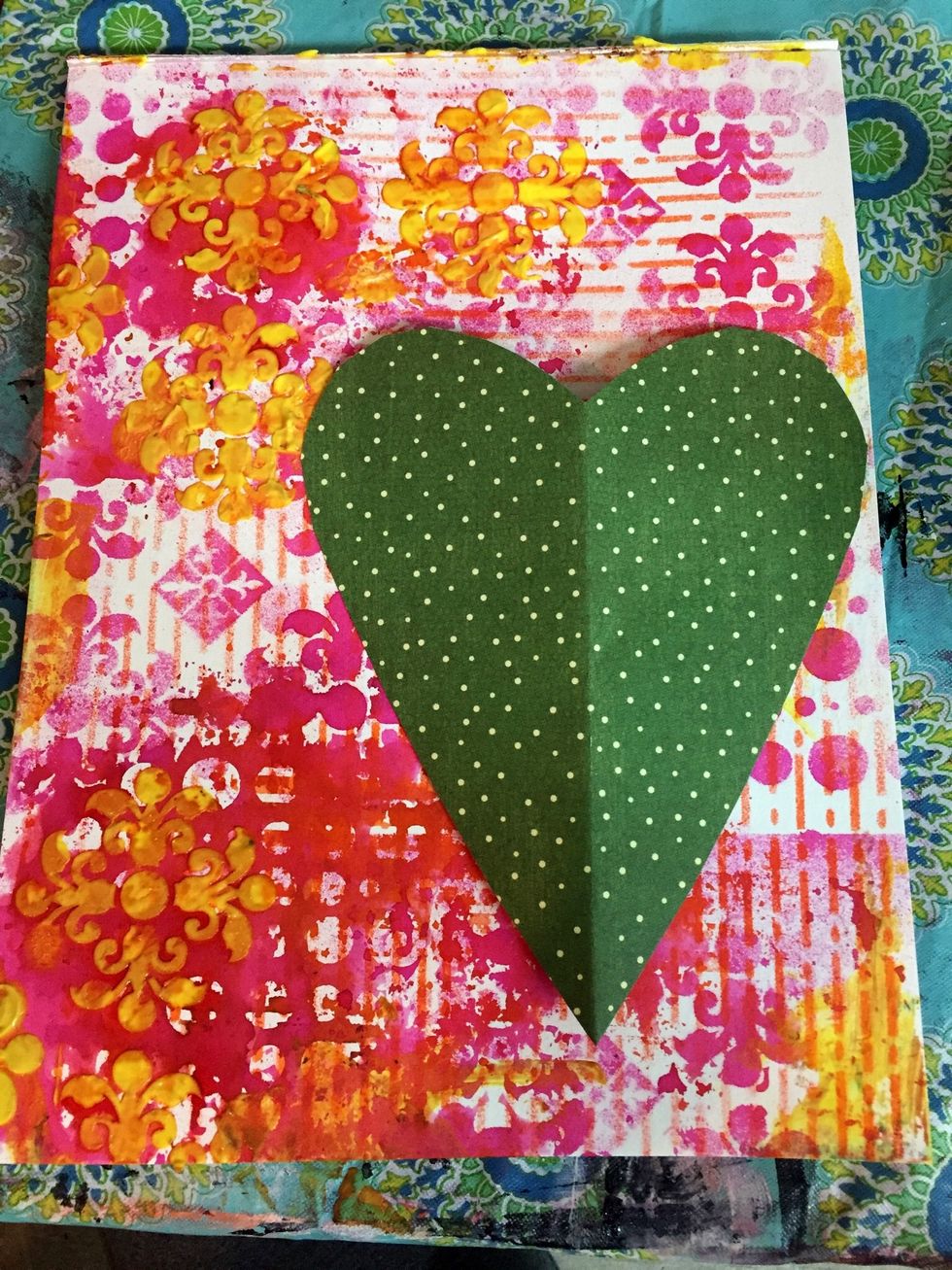 I cut a heart out of card stock to use as a mask.