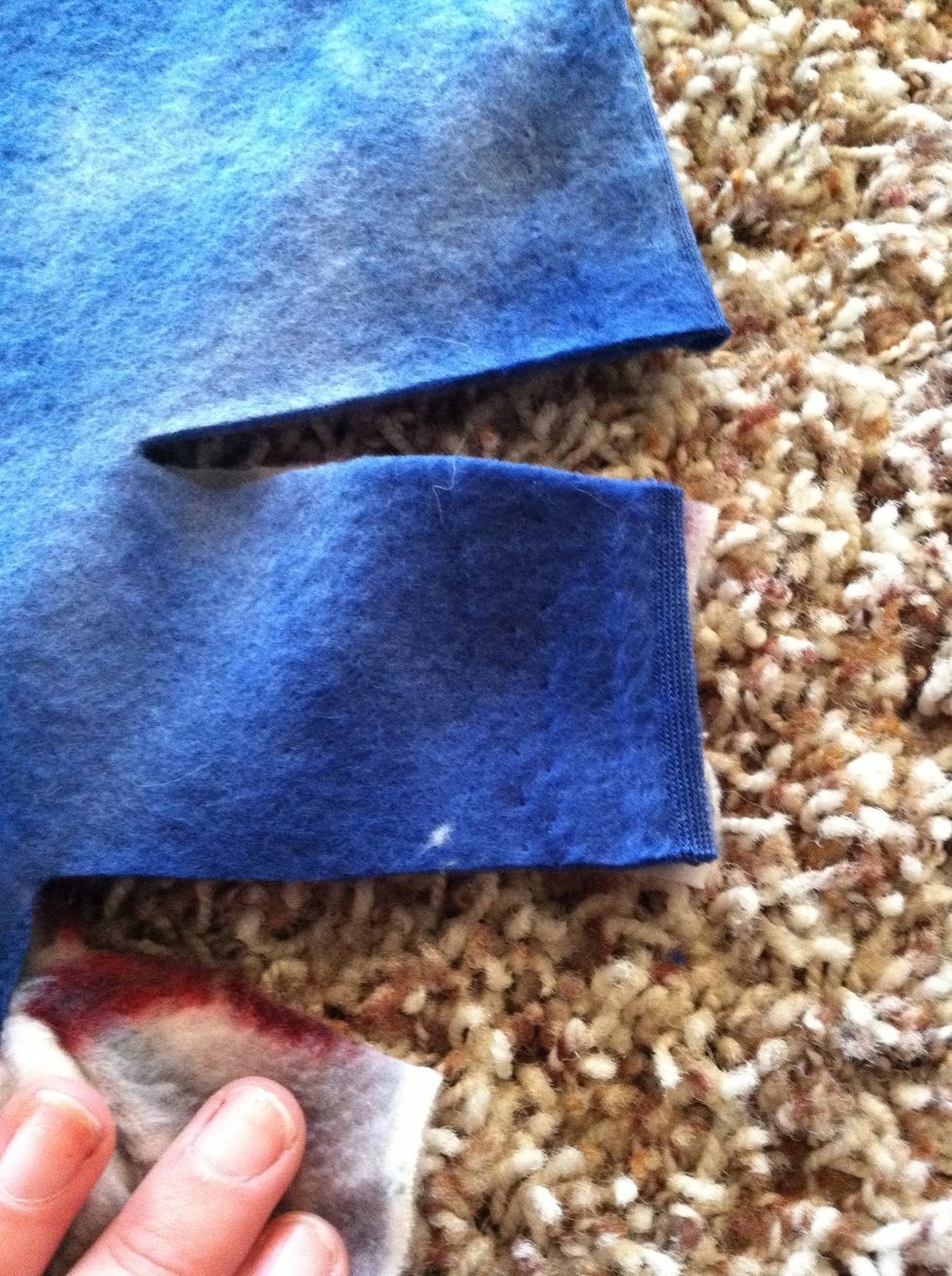 I cut about 2-3 inches in and about 1 inch wide... These dimensions aren't that important
