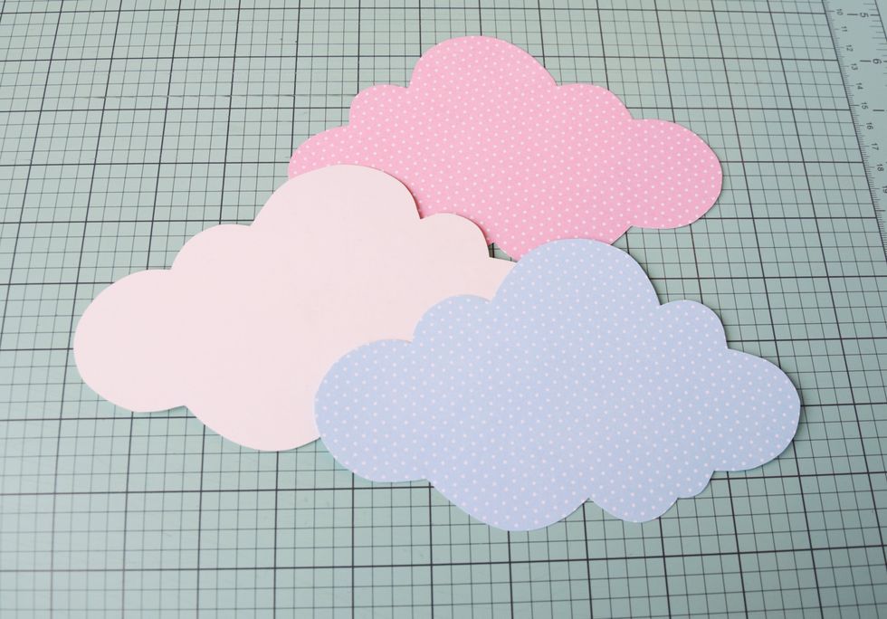 I cut it out 3 times (1x from cardstock and 2x from patterned paper).