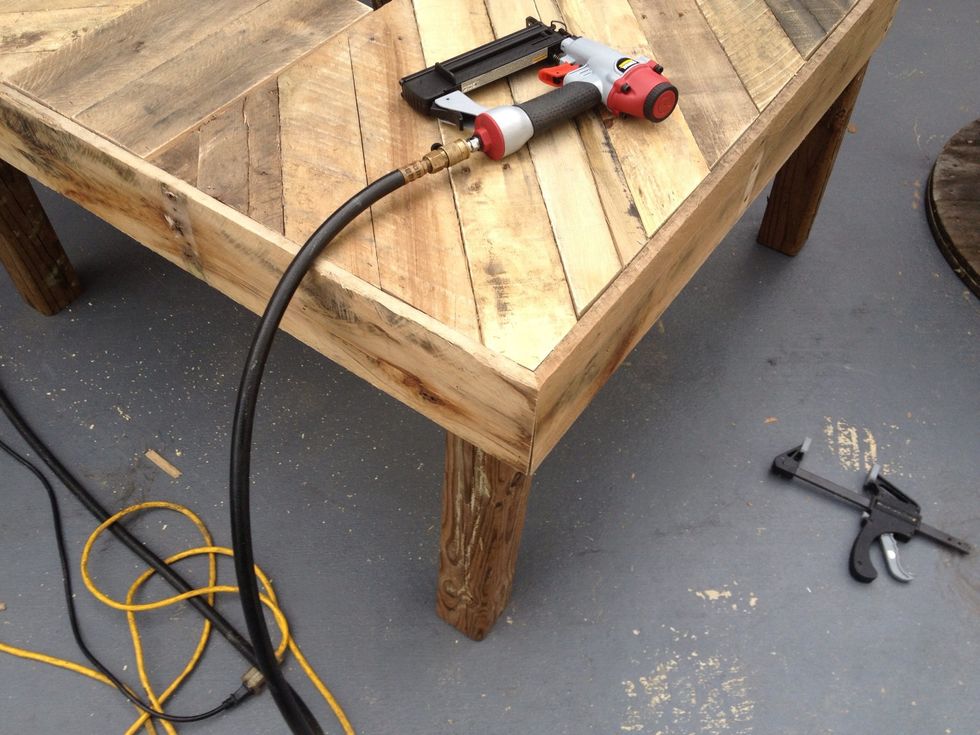 I cut more pallet wood to finishing off framing the table