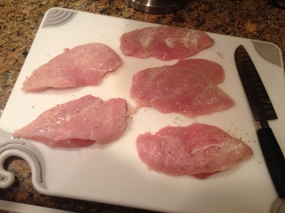 I cut my chicken breasts in half. If you didnt notice im makin a very large amount. Season with salt and pepper. I used santa maria seasoning.