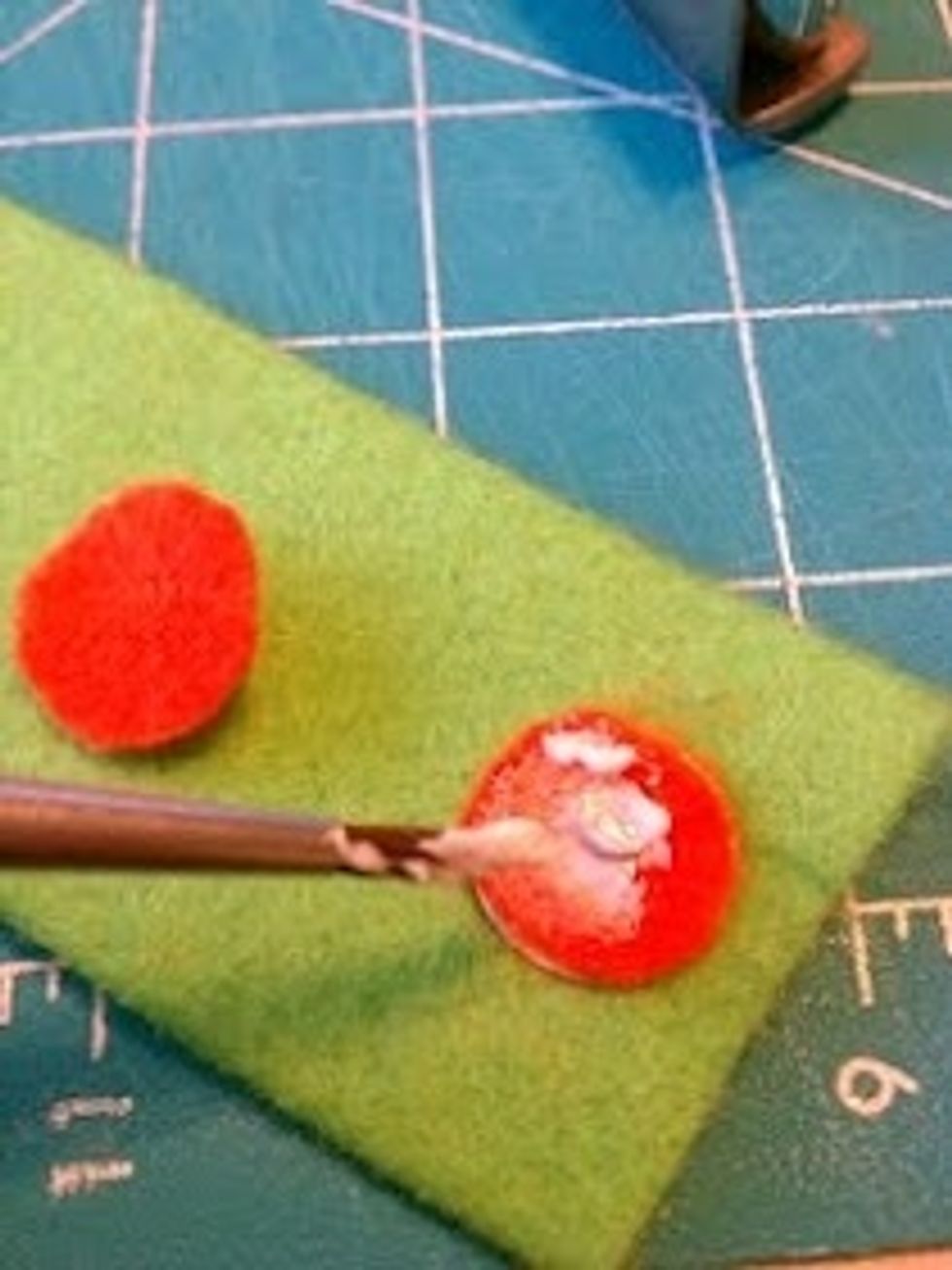 I cut out circles then Mod Podged the circles together to form a flower.