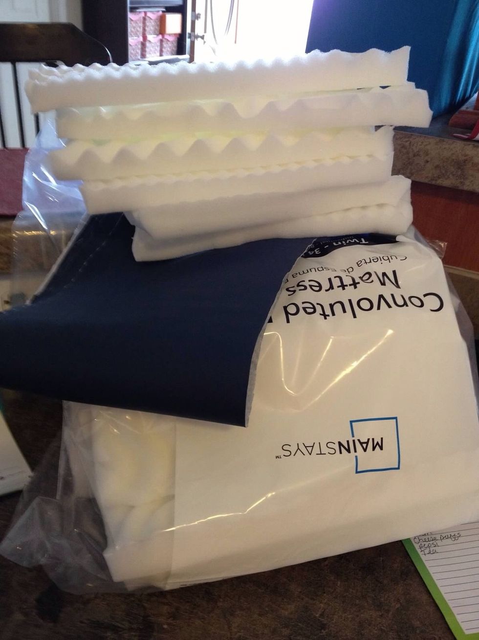 I cut rectangular pieces out of a mattress pad to use as padding for the turnbuckle covers and used vinyl fabric to cover the foam. (The mattress pad was much cheaper than buying foam pieces)