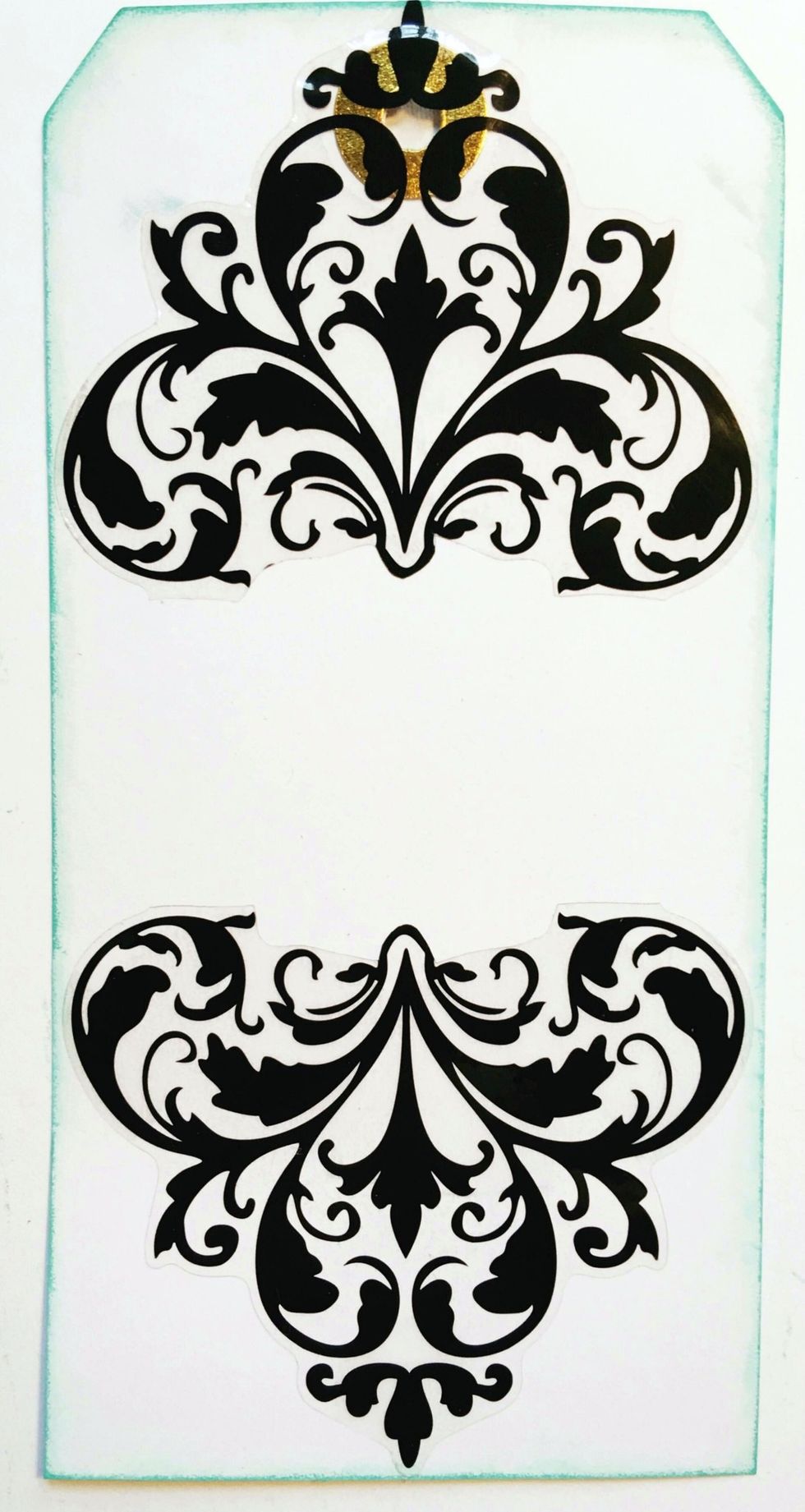 I cut the black damask stickers to fit my tag.