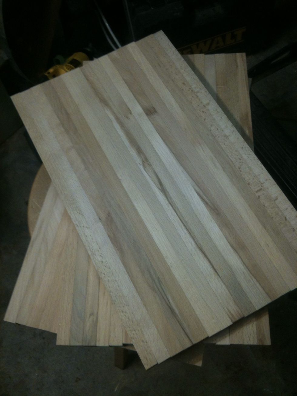 I cut the boards in half. They are easier to work with when sanding.