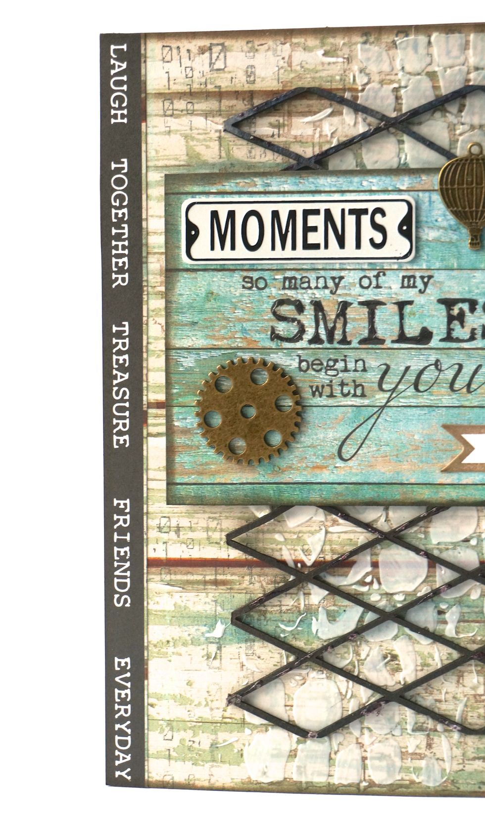 I cut the border from one of the Kaisercraft papers and added it as a "binding" to the edge of the card!