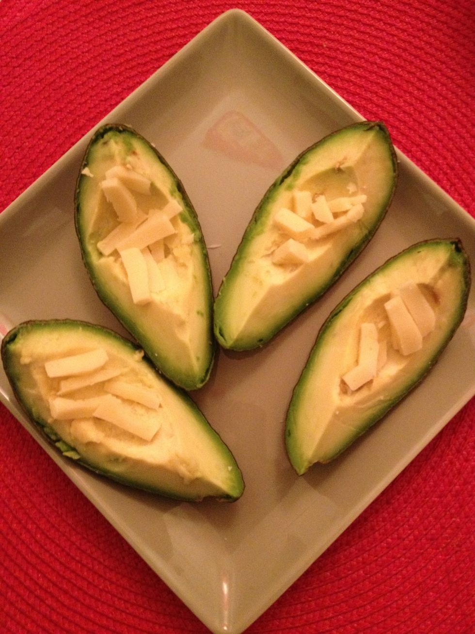 I cut the cheddar cheese and served them on the avocado quarters... Usually I add feta cheese but I ran out of them today!