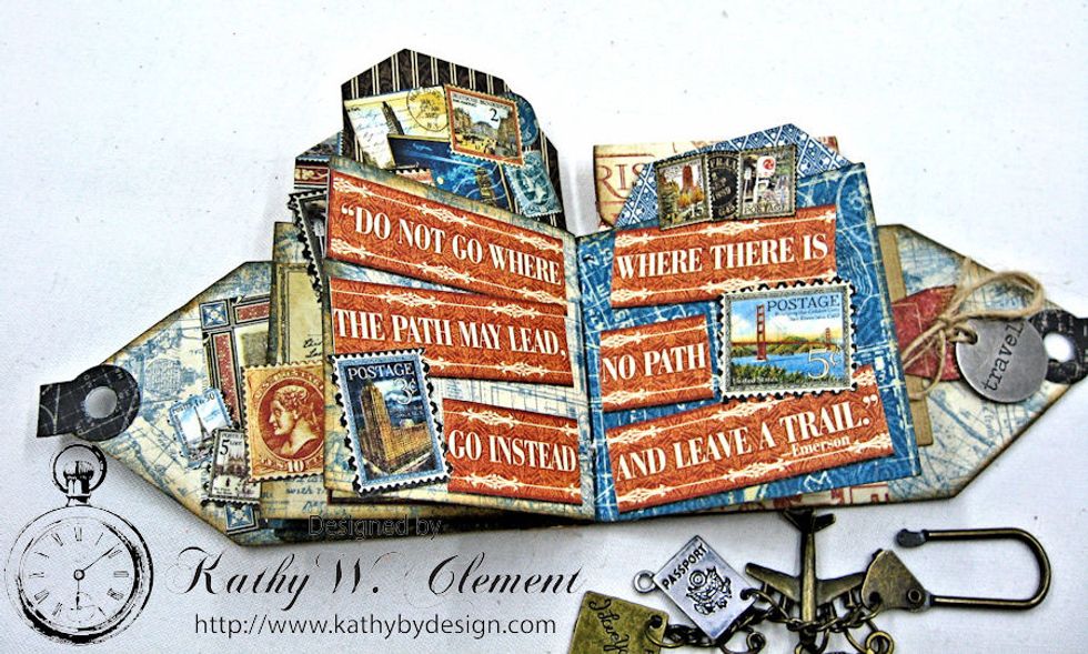 I cut this large border strip from the 12x12 papers into strips and then added it to these two pages. Once again,, I added fussy cut stamps to amp up the design.