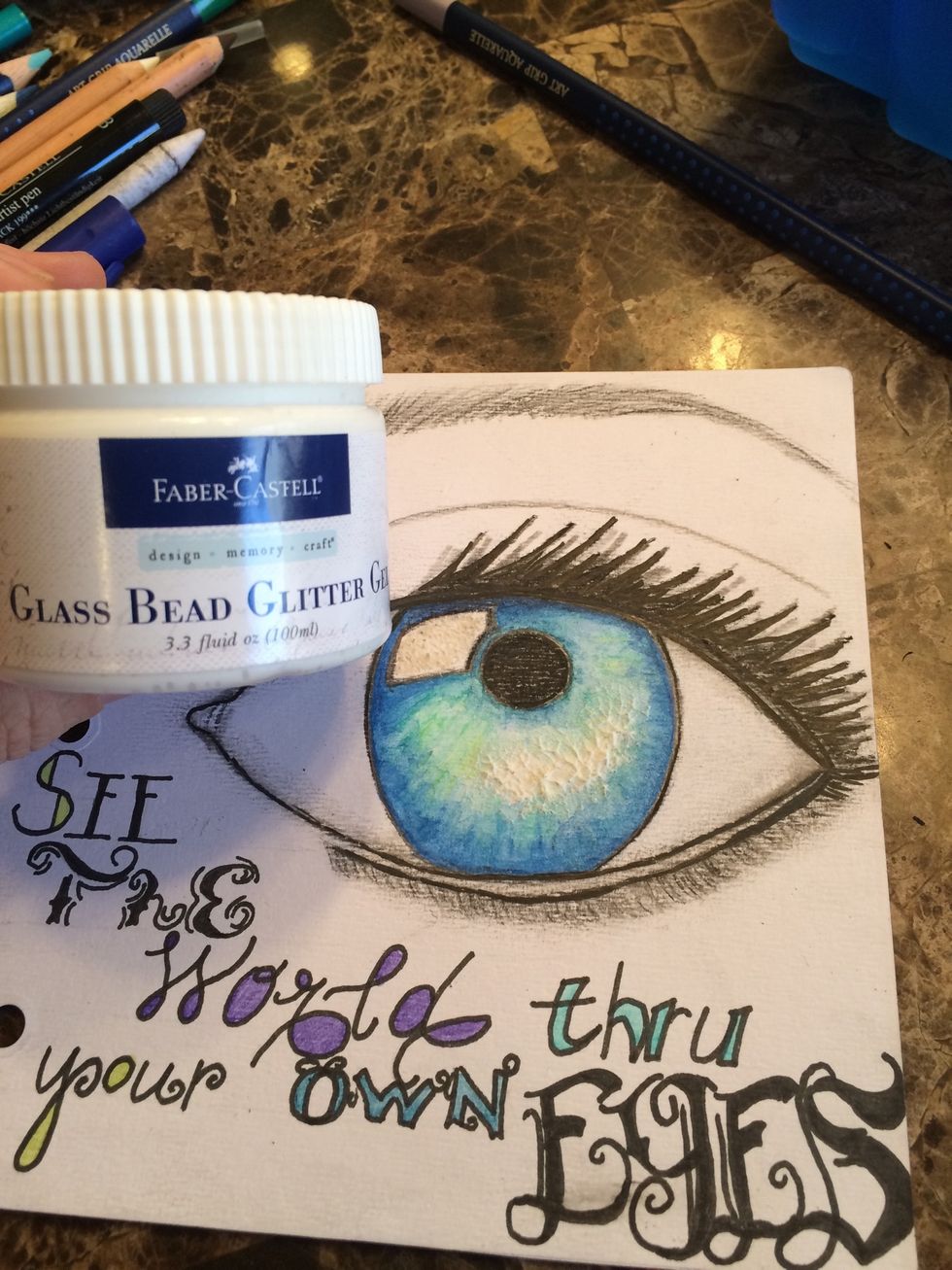 I decided my eye needed a little GLAM, so I grabbed my Faber Castell Design Memory Craft (R) Glass Bead Glitter Gel and added it on top of my Whipped Spackle in the white areas. Allow to dry.