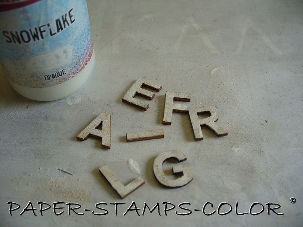 I decided to add a title.. to fill up the space at the top.. What word can you make of this ? YES.. F R A G I L E.. that's what my creation is about!