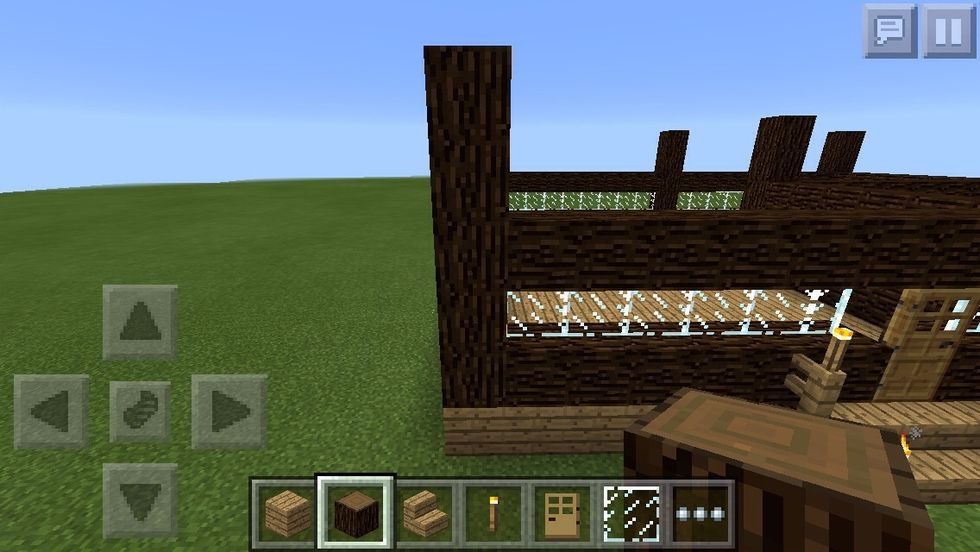 I decided to add one more spruce wood block to the towers.