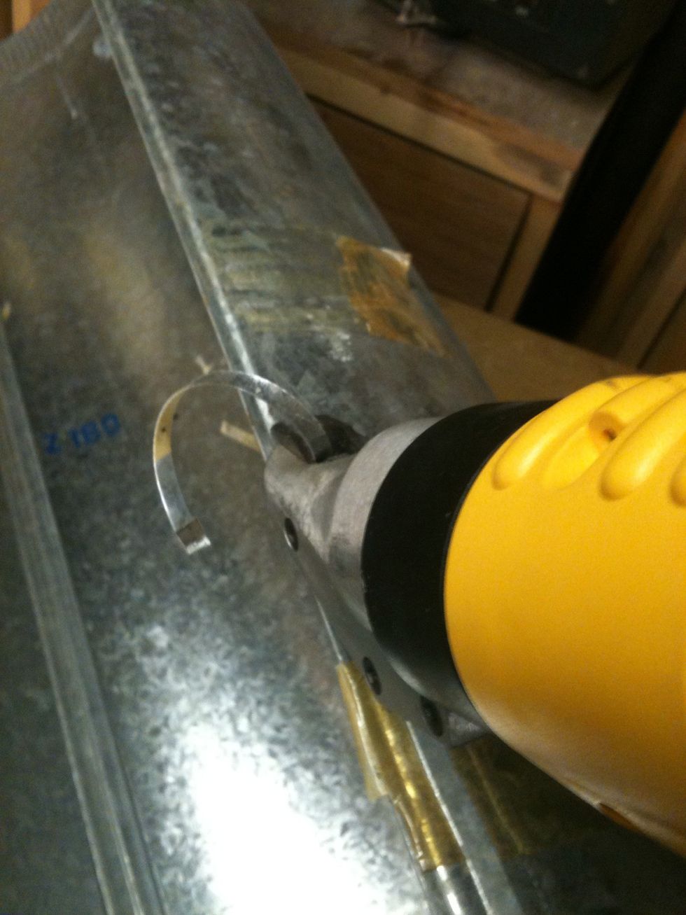 I decided to take the snap lock edges off. Having a power tin snips comes in handy.