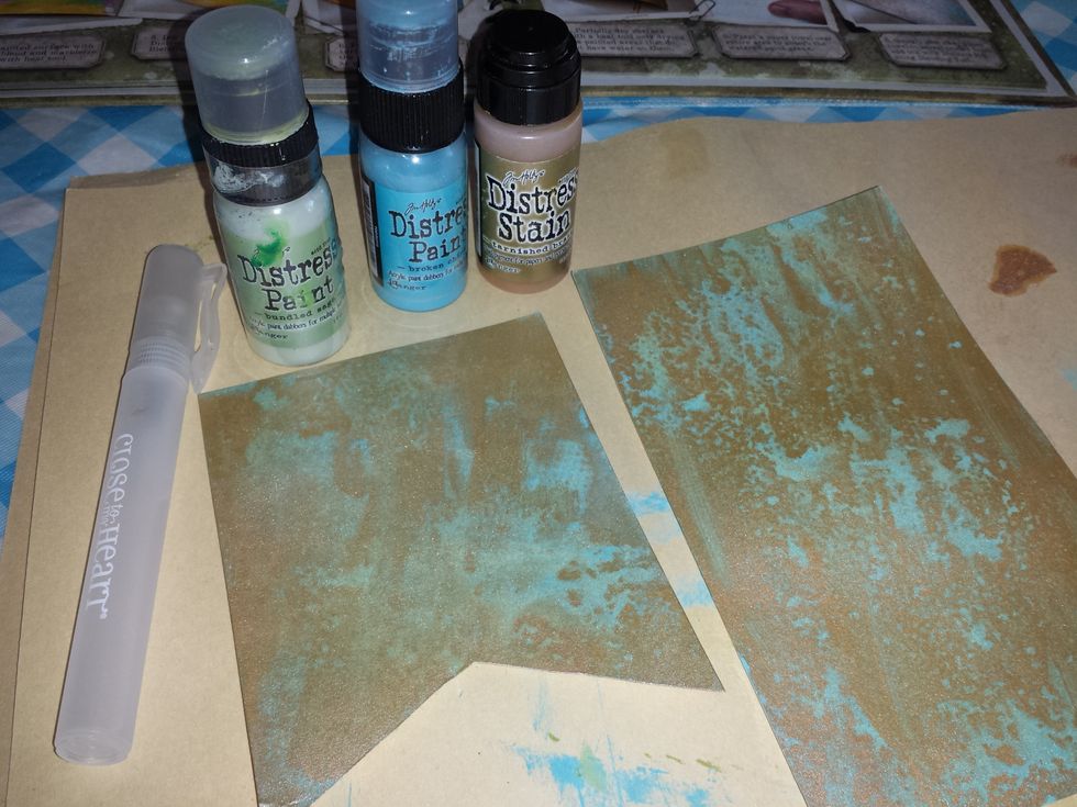 I did the Compendium of curiosities III "eroded metal" technique for the banner background ( Tim Holtz)