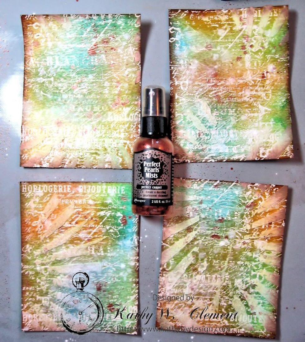 I did the same thing with Perfect Pearls Copper Mist. I love the metallic gleam this adds to the background pieces.