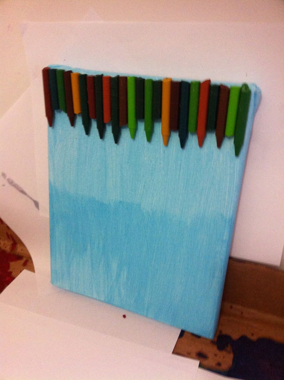 I did this in my bathtub with cardboard and paper lining the tub. The crayons will splatter so make sure you put something down