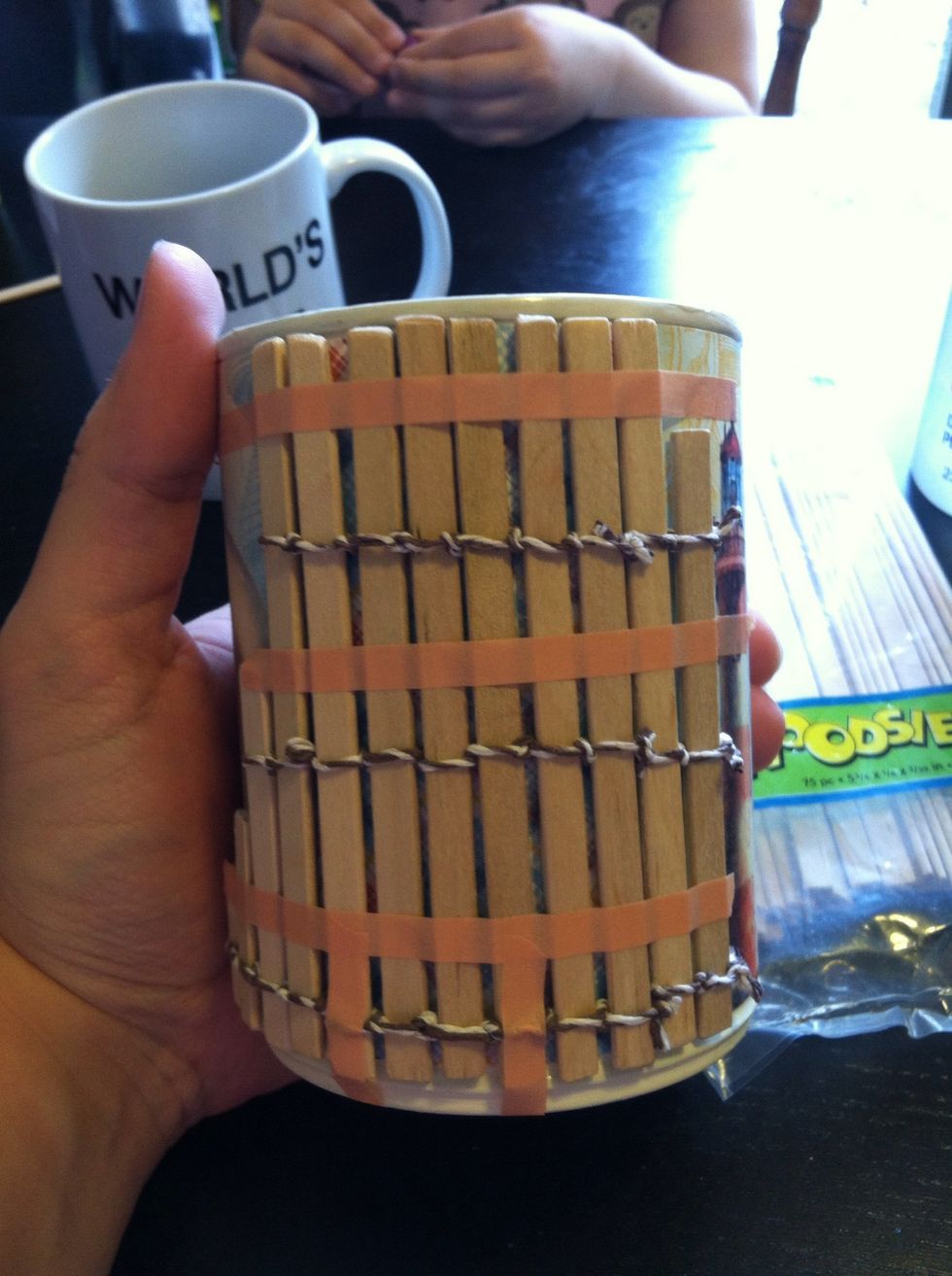 I didn't like how the wood fencing stopped at the plaid, so I tied together 6 more can-height Woodsies to put over the plaid paper.