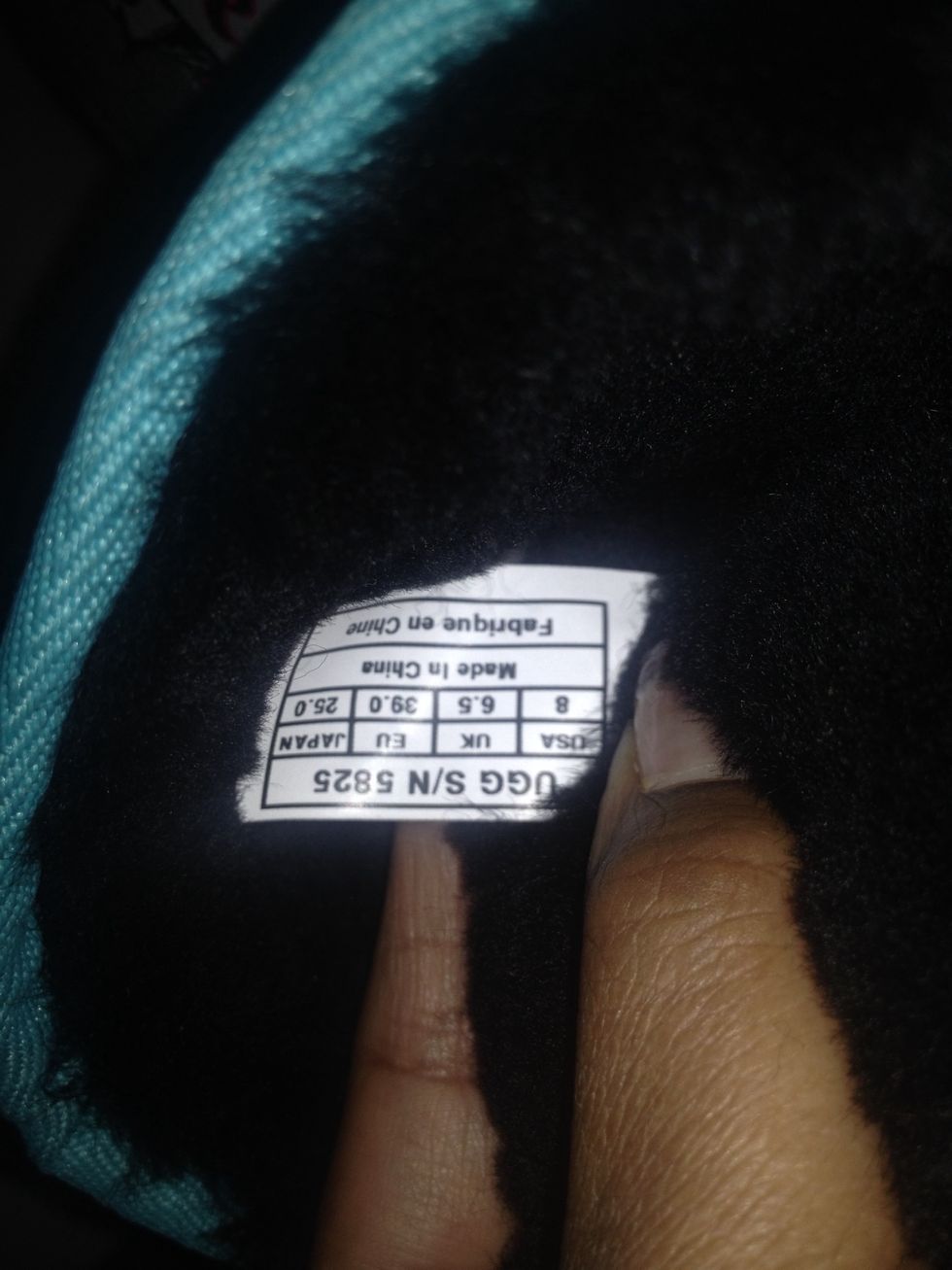 I didn't mean for this to be upside down but it's the UGG\u00ae tag. Gives you the size, and all of that Important info