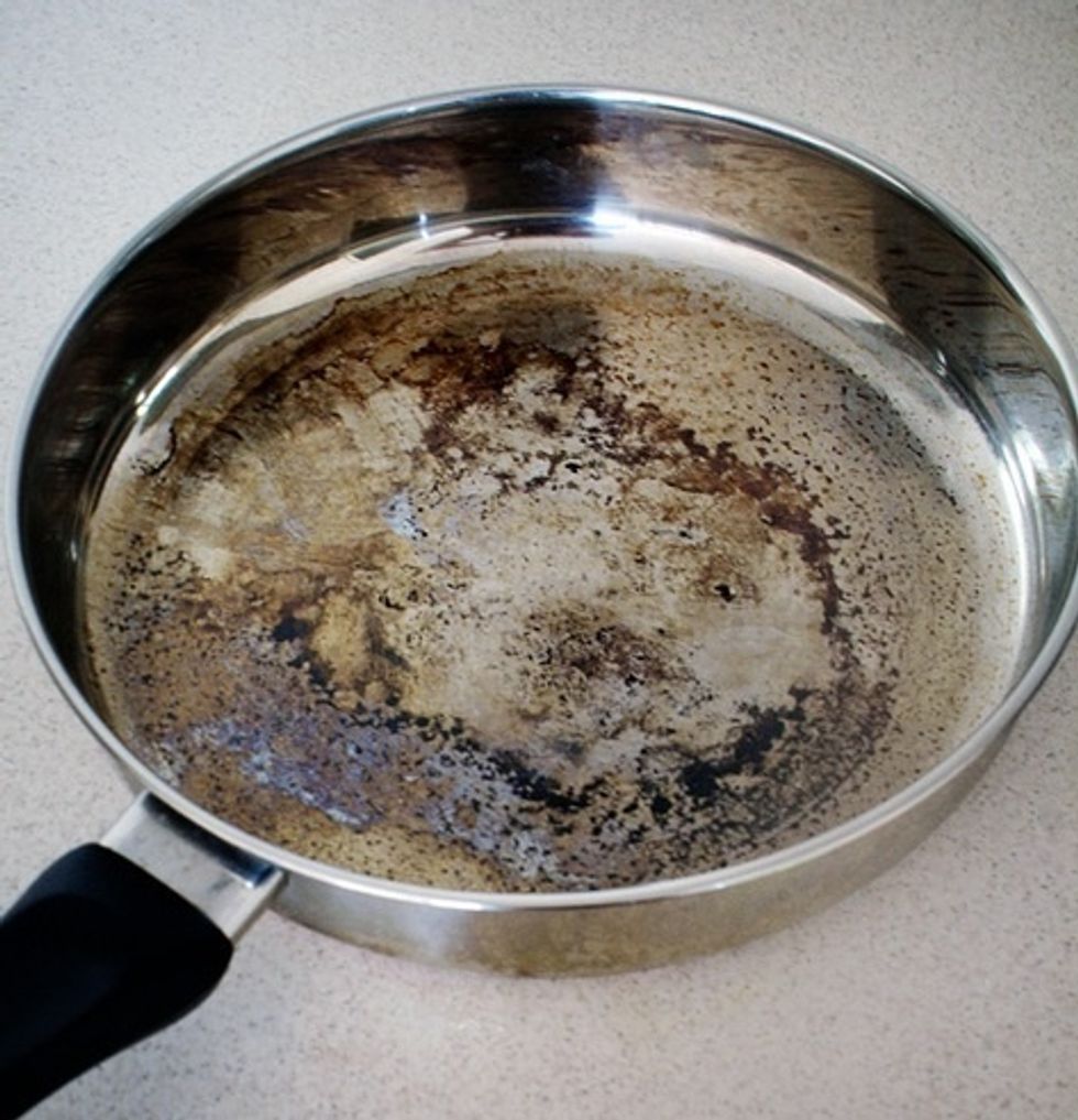 I didn't take a photo of my burnt pan. But I found this photo online that more or less captured what it looked like. Only mine was worse. And greasy. Yuk!