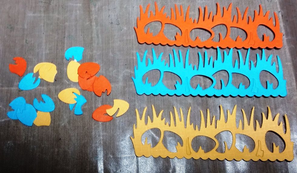 I die cut 3 more strips in orange, turquoise and yellow and just kept the colored eggs portion.