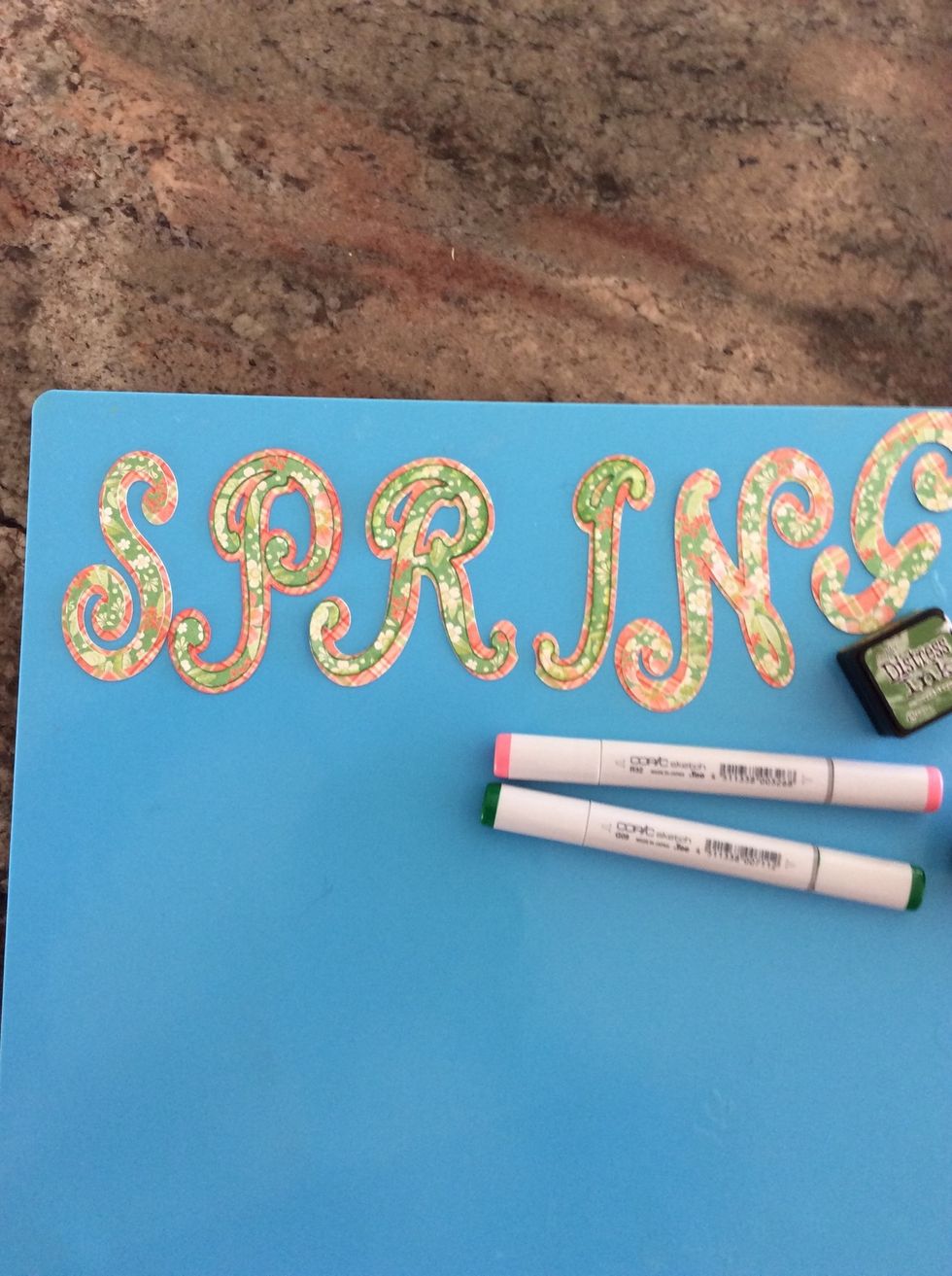 I die cut my letters with shadow letters, but you can use pre cut ones from the craft store or fussy cut them. I use ink or marker to define the edges.