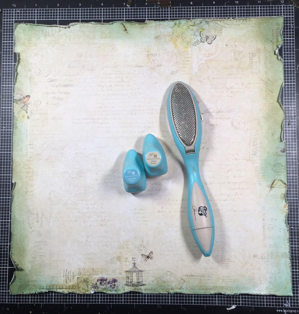 I distressed the edges again in parts I felt needed it, then used some chalk edgers, Turquoise Stone, and Pastel Brown to the very edge. The impact is slight, but I think it gives it a complete look.