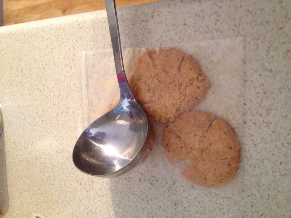 I don't have a food processor so I have to crush my own biscuits. Place them a few at a time in a ziplock bag, zip up, and beat the bejeesus out of them with something that's heavy but not sharp.