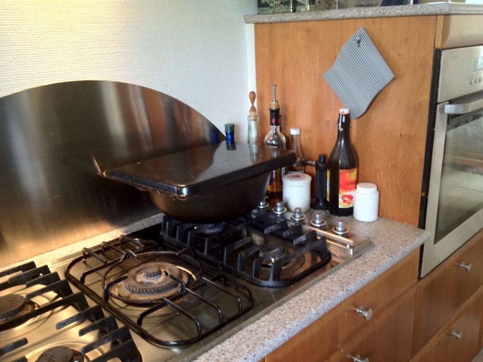 I don't have a lid that fits so I use a baking sheet. Boil for 45 minutes on low heat.