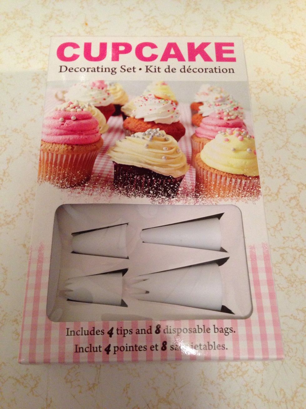 I don't remember how this thingy is called in English, but you will need it :) I got it from the dollar store for $2. Used the upper left one (wide and round hole).