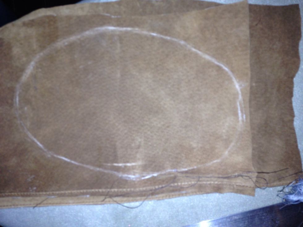 I drew a rough shape out and cut through both pieces, it helps to pin them but pin the parts that get cut off together as we want to cut down on the holes we make in the suede.