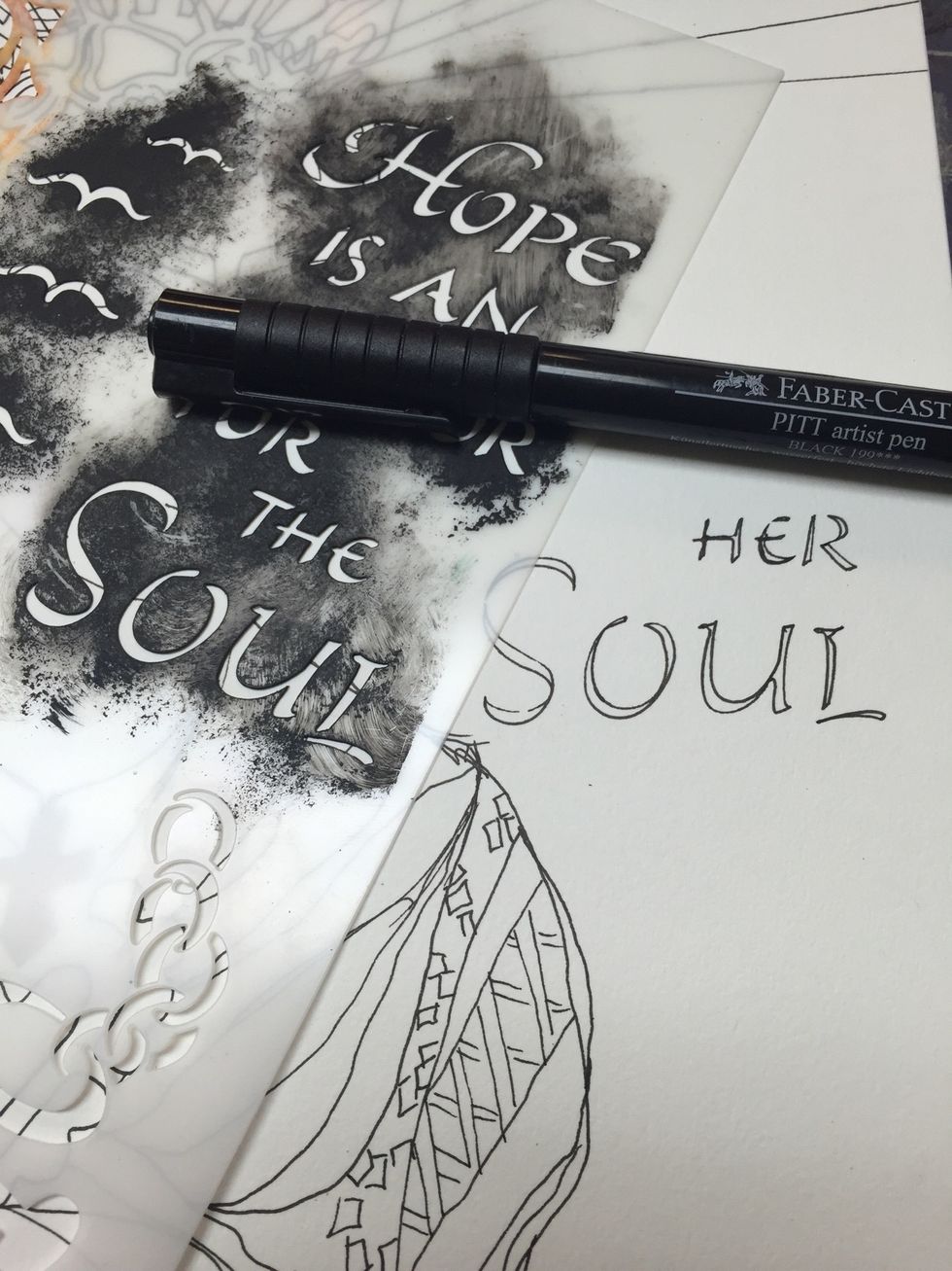 I drew over soul and found letter to help me write her in the same font using the same stencil