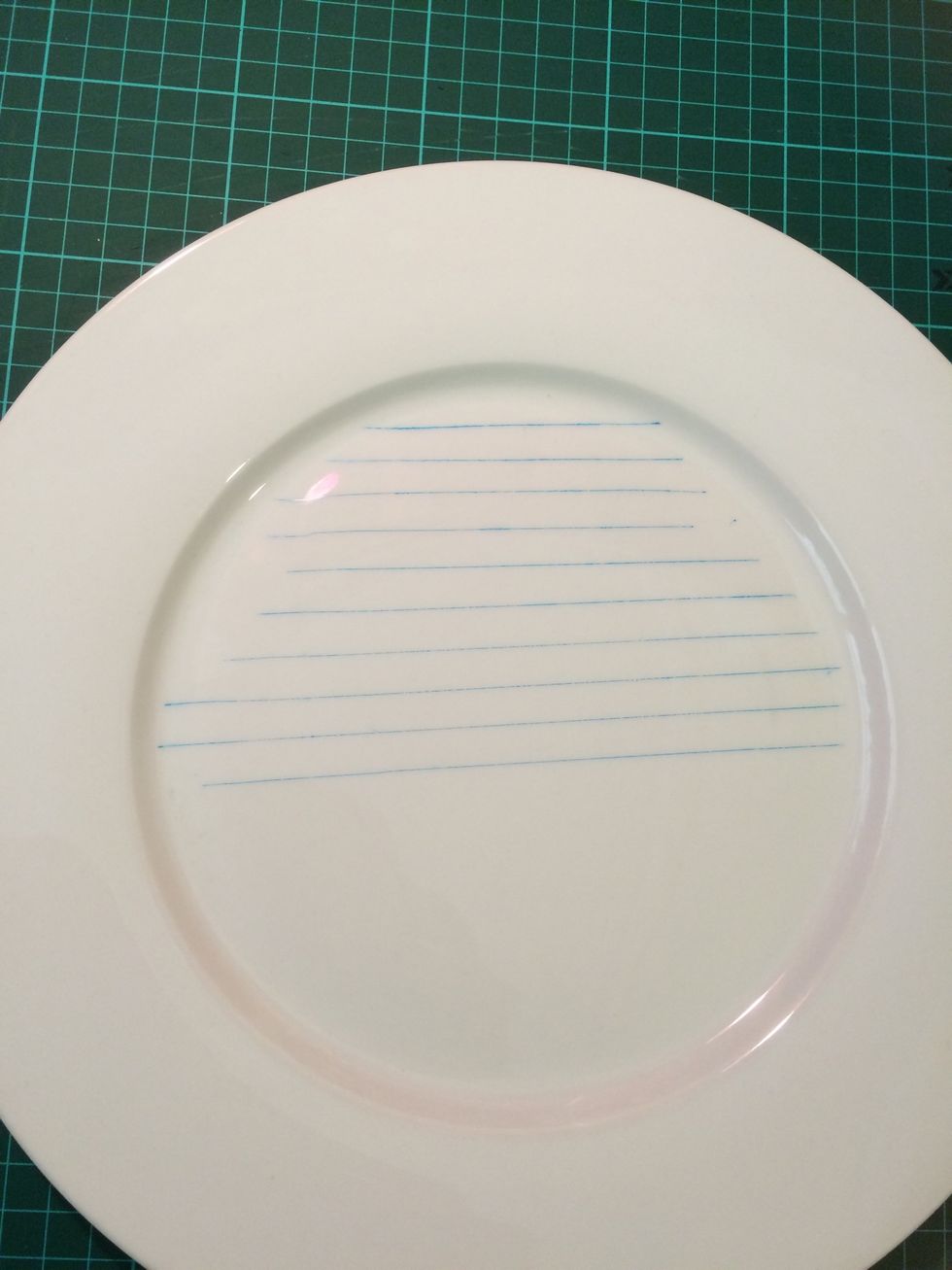 I drew some lines with a felt tip pen as guides