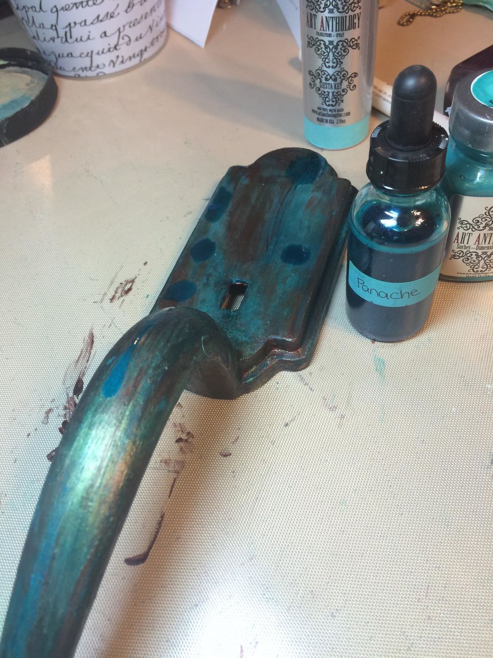 I dropped Panache Minx onto the door handle then rubbed in it with my fingers.