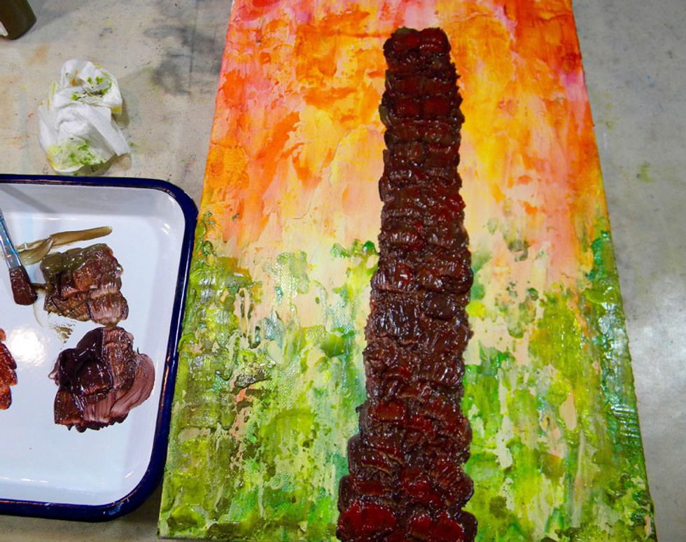 I ended the trunk about 8 inches from the top of the canvas. Make sure to use lots of paint and work quickly.  The paint needs to be wet for the next step.  You can work in stages if you want.