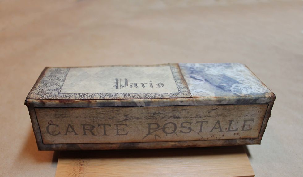 I felt the piece needed a little pink tone over the brown so I blushed across the front of the box and front background with a touch of Tattered Rose distress ink. Go lightly.