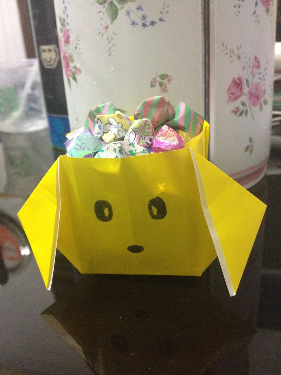 I filled my box with origami stars, you can fill them with candies or anything you want! :)