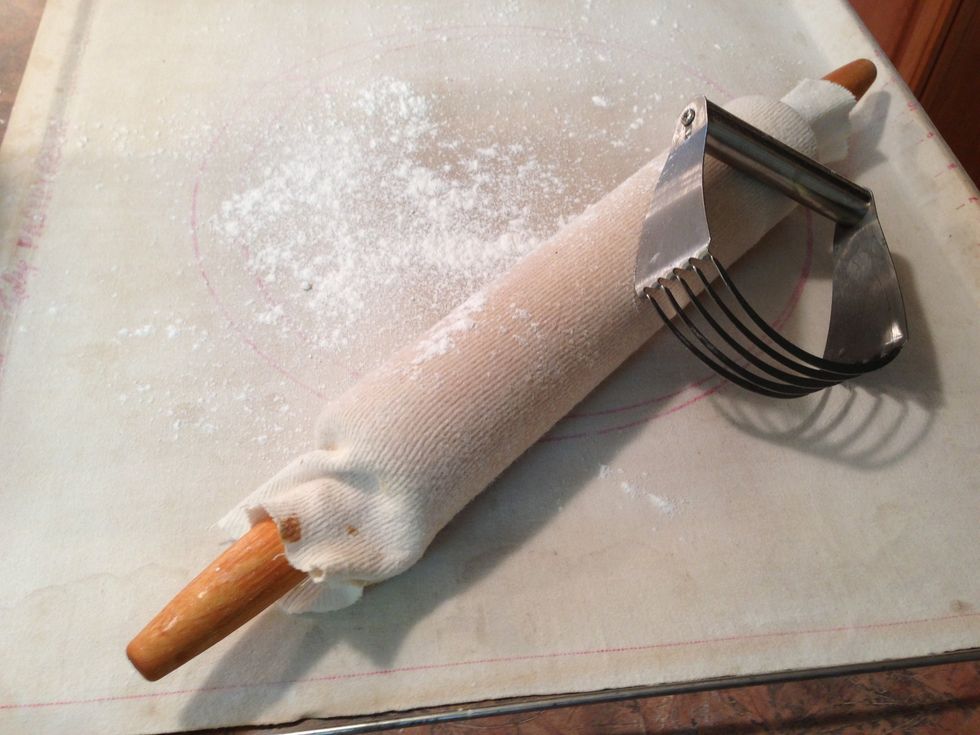 I firmly believe a pastry cloth & covered rolling pin work best. (I store the used cloth in a plastic bag in freezer to keep fresh)