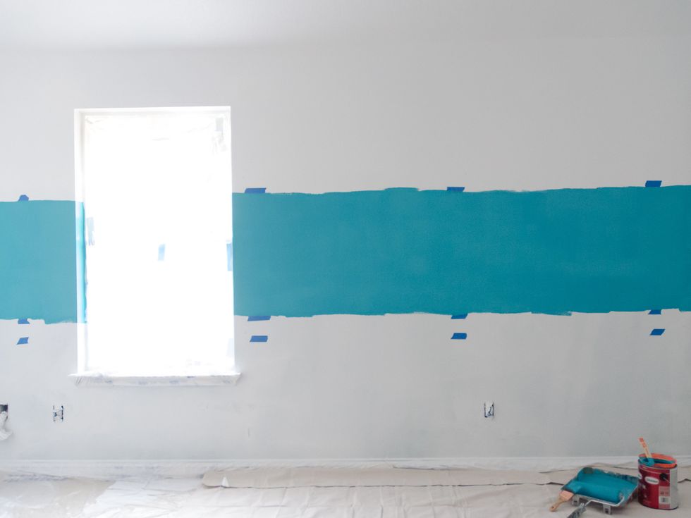 I first painted the Glidden Paint+Primer in Marine Blue in the top section that I marked. I didn't worry about trying to make a straight line since I'll be blending colors.