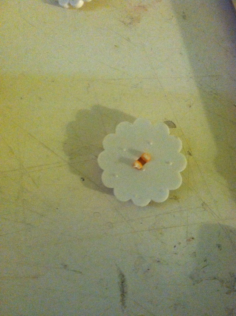 I fist cut of the back of the buttons