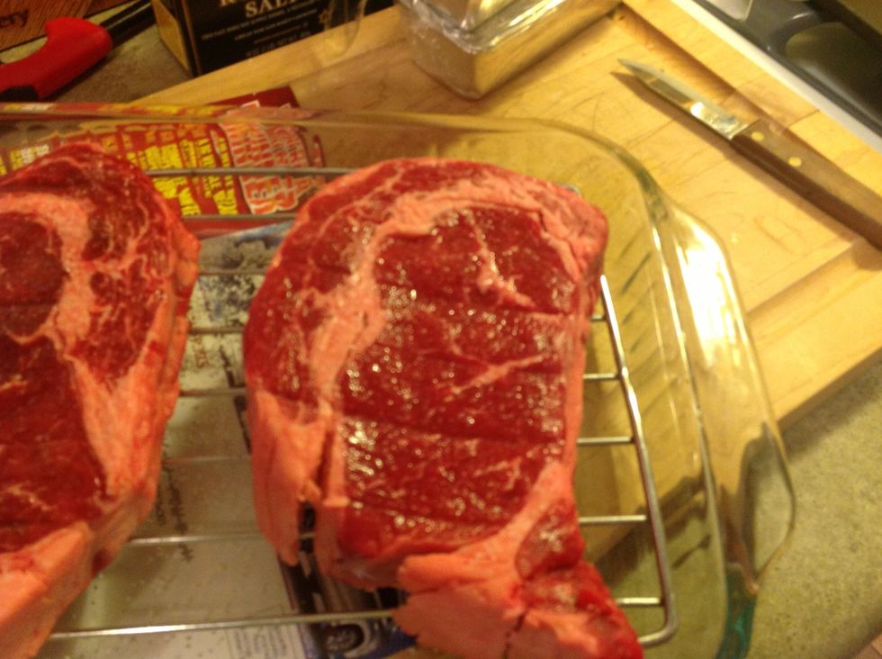 I flipped these after 45 minutes. Notice the glossy sheen? The salt draws out the moisture from the meat. Then, as the moisture draws back into the meat, it pulls some salt along with it.