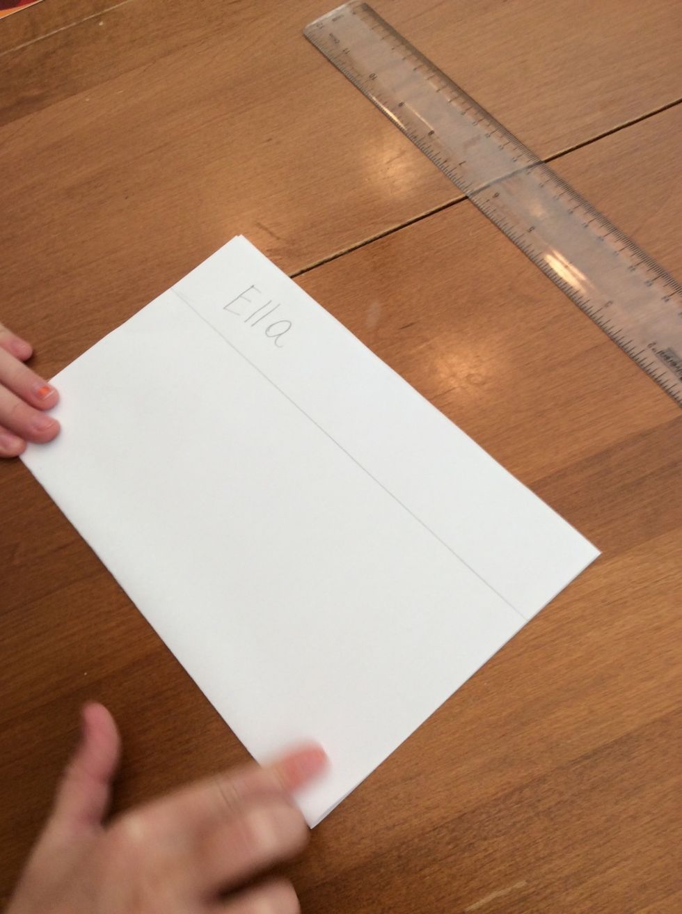 I fold my paper in half and keep my name at the top.