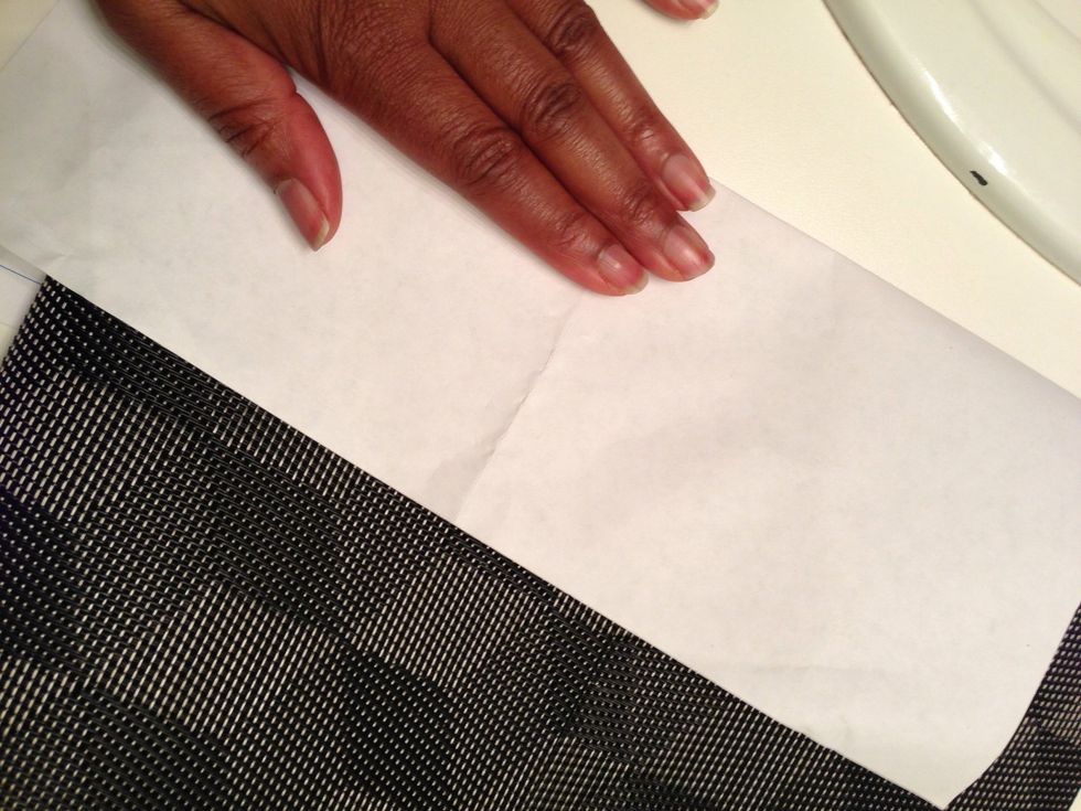 I folded a piece of paper along the edge to press the sides together & to keep from getting glue on my hands. Ewww, sticky icky! :0). Repeat on the other side.